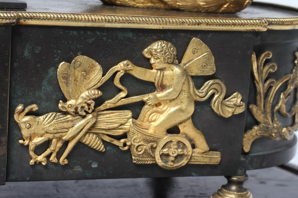 A FRENCH GILT AND PATINATED BRONZE MANTEL CLOCK BY BREGUET Image