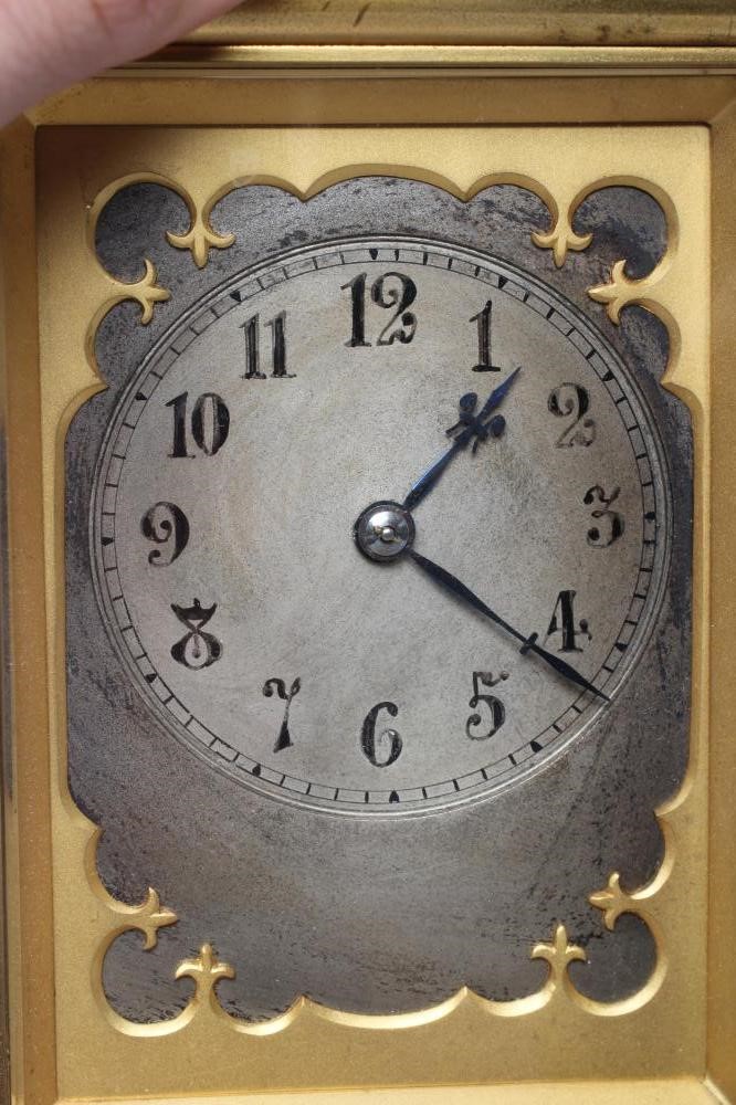 A BRASS CASED CARRIAGE CLOCK Image