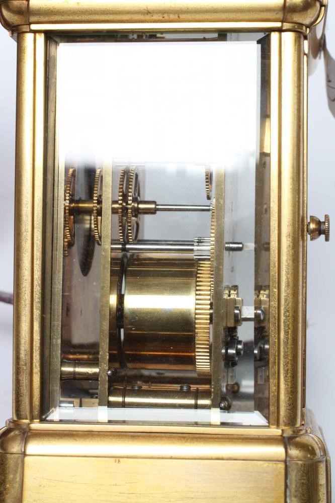 A BRASS CASED CARRIAGE CLOCK Image