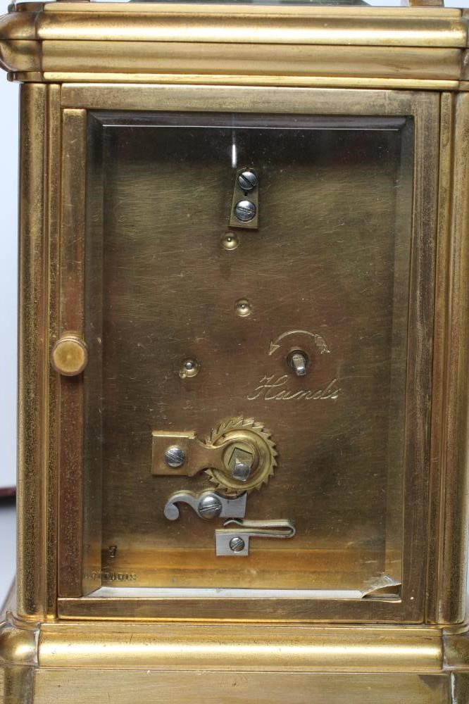 A BRASS CASED CARRIAGE CLOCK Image