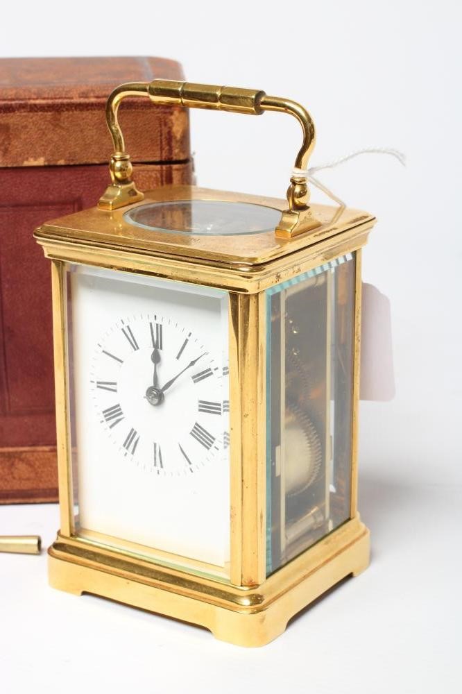 A BRASS CASED CARRIAGE CLOCK Image