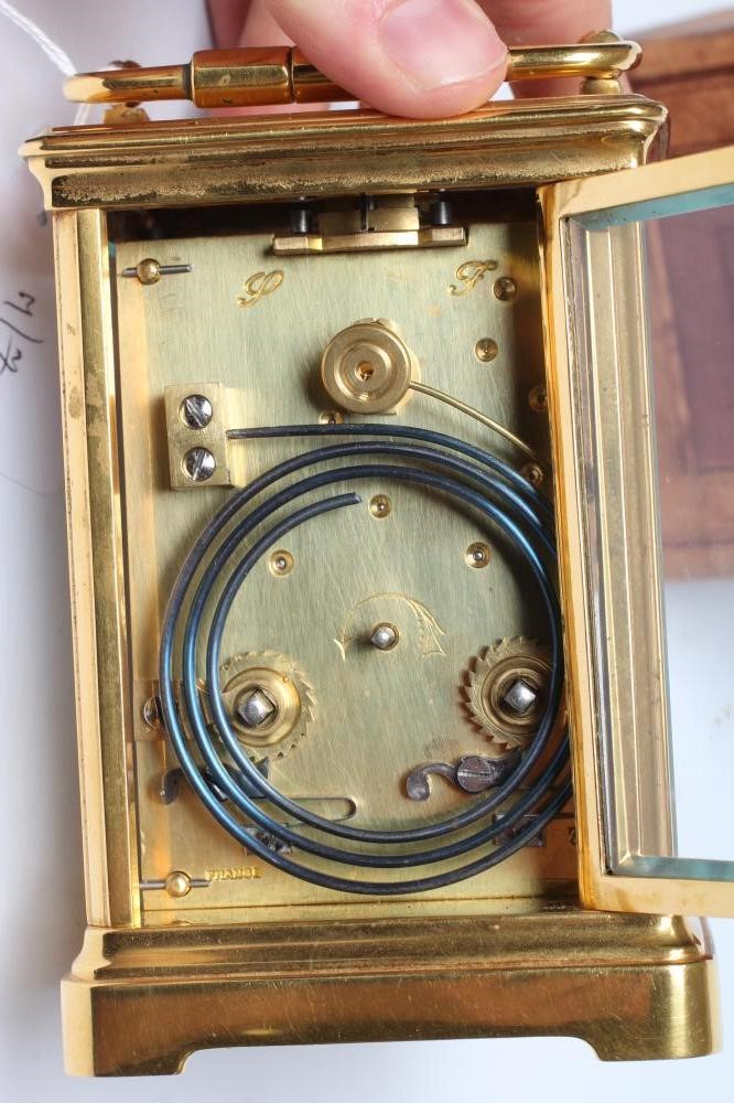 A BRASS CASED CARRIAGE CLOCK Image