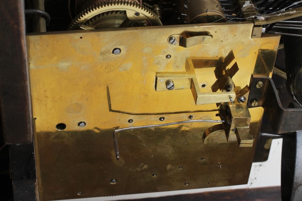 A MAHOGANY CHIMING LONGCASE CLOCK Image