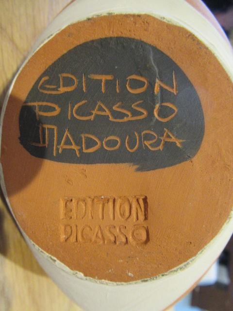 PABLO PICASSO (1881-1973) A red earthenware fish pitcher with black and white markings Image