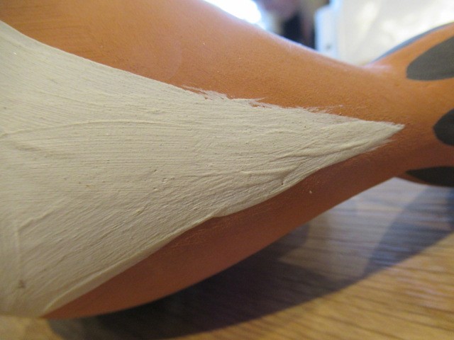 PABLO PICASSO (1881-1973) A red earthenware fish pitcher with black and white markings Image