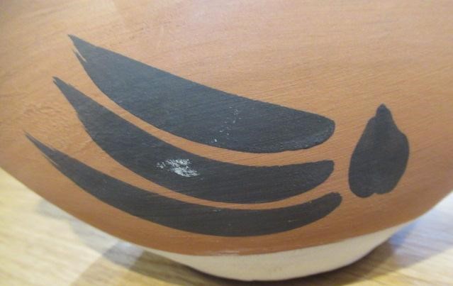 PABLO PICASSO (1881-1973) A red earthenware fish pitcher with black and white markings Image