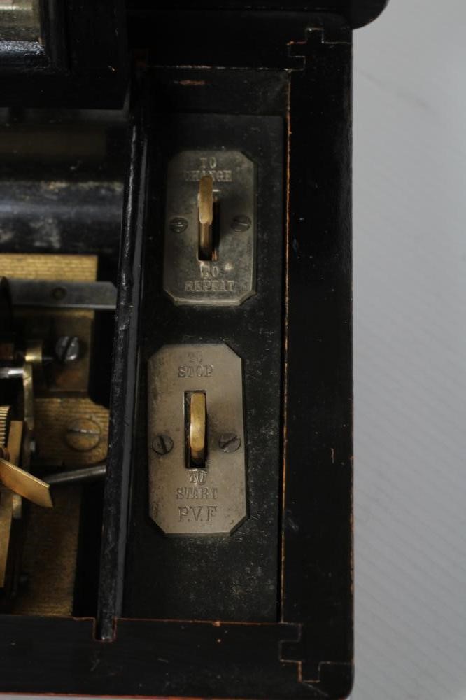 A SMALL SWISS MUSICAL BOX Image