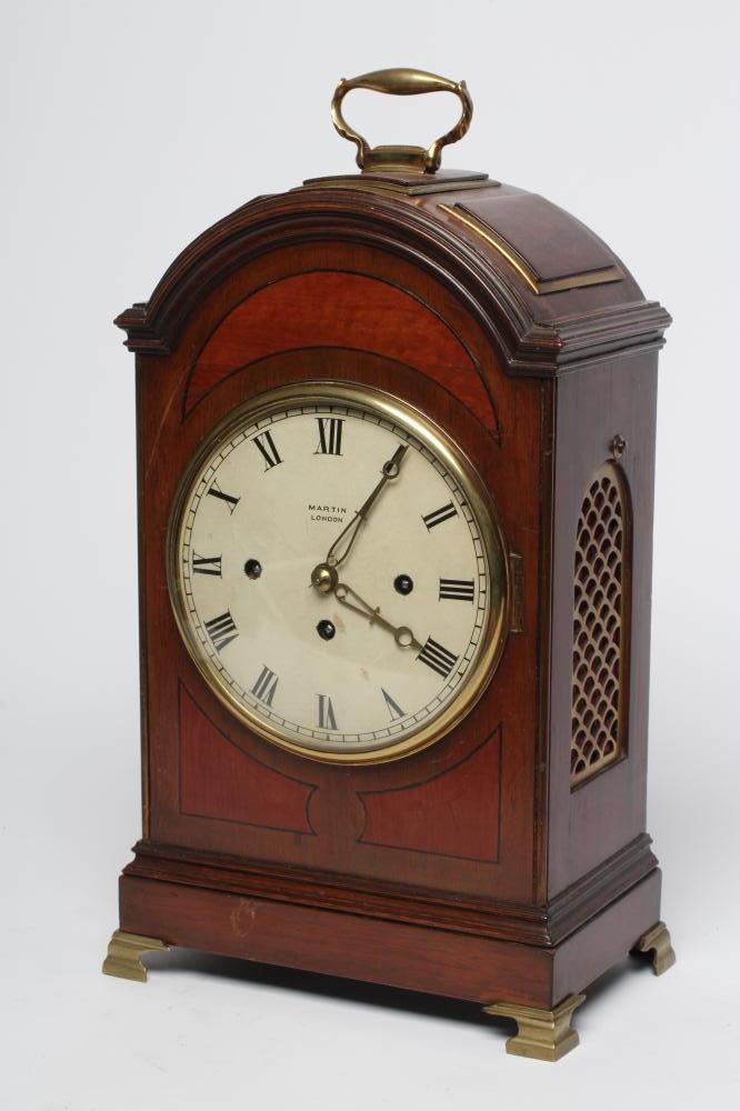 A MAHOGANY CASED MANTEL CLOCK Image