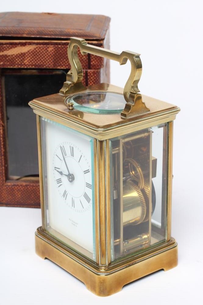 A BRASS CASED CARRIAGE CLOCK Image
