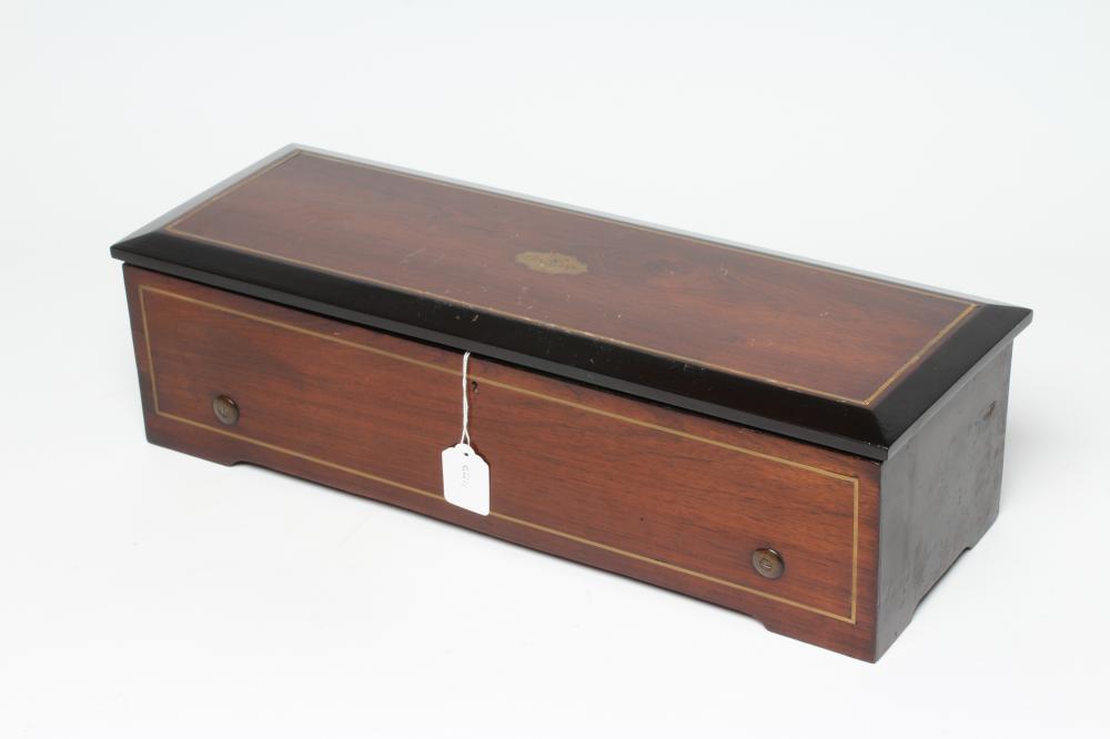 A VICTORIAN MUSICAL BOX playing six airs as detailed on the tune sheet Image