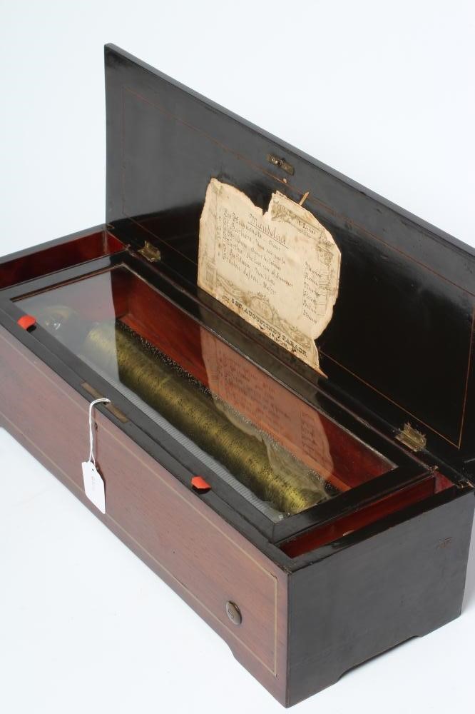 A VICTORIAN MUSICAL BOX playing six airs as detailed on the tune sheet Image