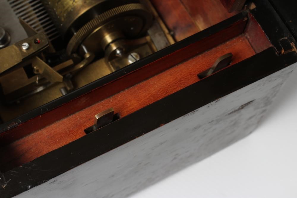 A VICTORIAN MUSICAL BOX playing six airs as detailed on the tune sheet Image