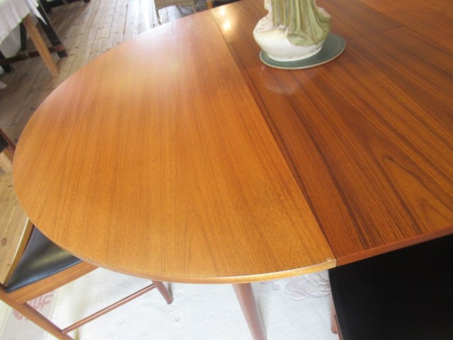 AN H. MCINTOSH & CO. KIRKCALDY TEAK DINING SUITE Image