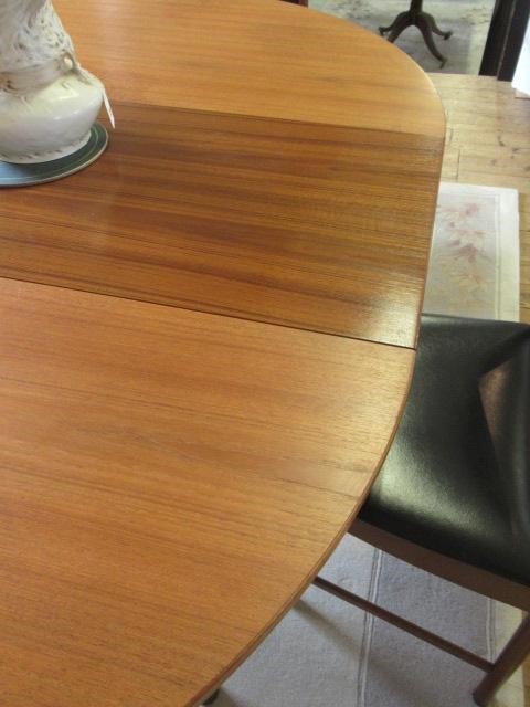 AN H. MCINTOSH & CO. KIRKCALDY TEAK DINING SUITE Image