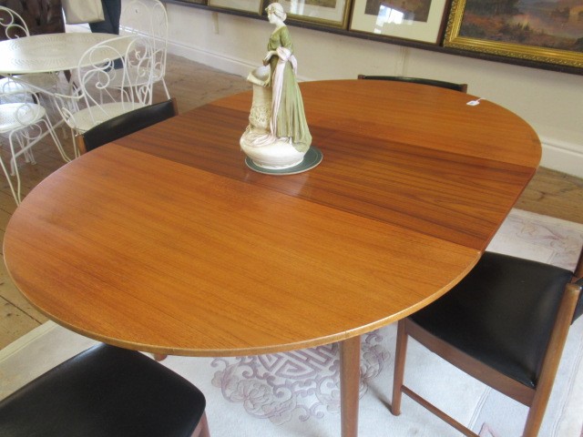 AN H. MCINTOSH & CO. KIRKCALDY TEAK DINING SUITE Image