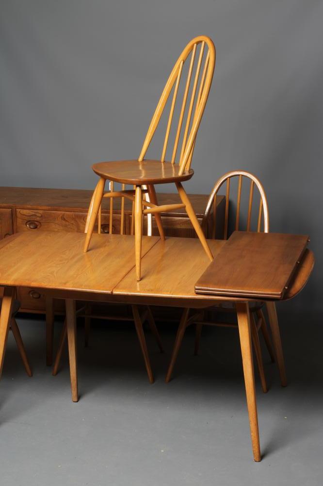 AN ERCOL LIGHT ELM DINING SUITE Image