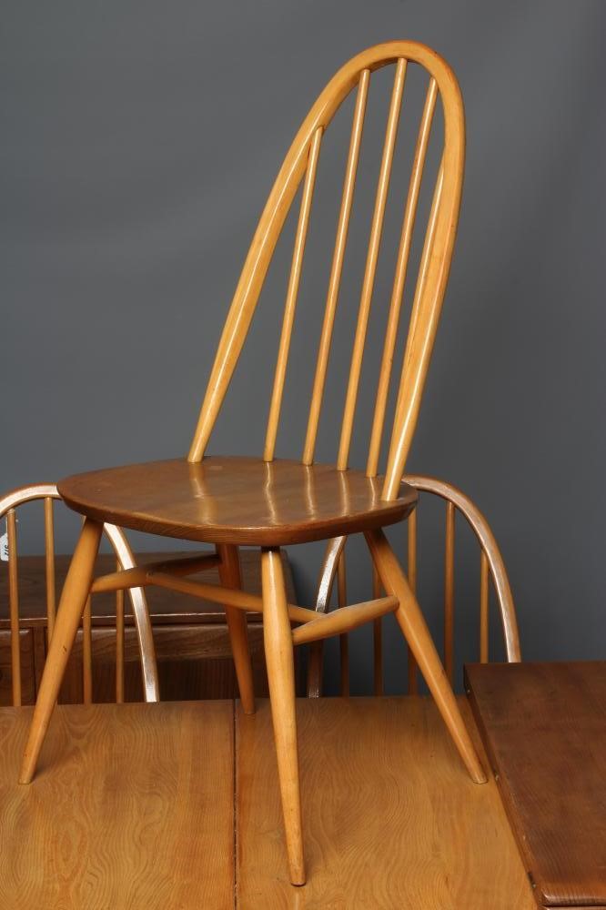AN ERCOL LIGHT ELM DINING SUITE Image