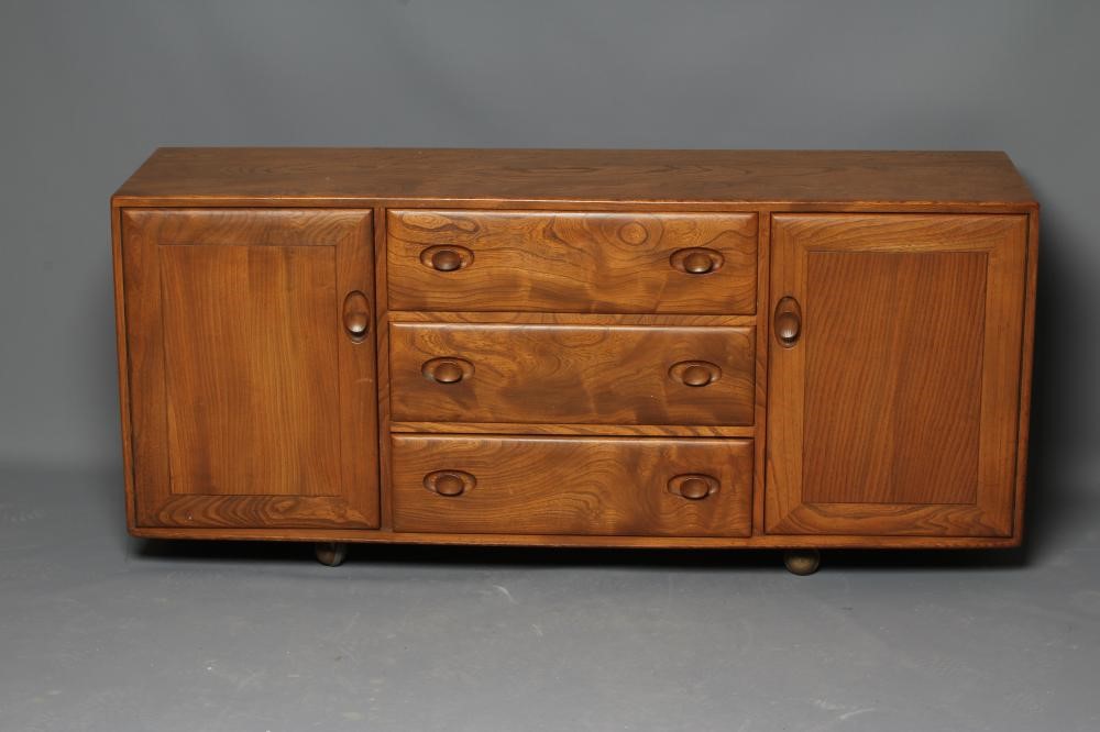 AN ERCOL LIGHT ELM DINING SUITE Image