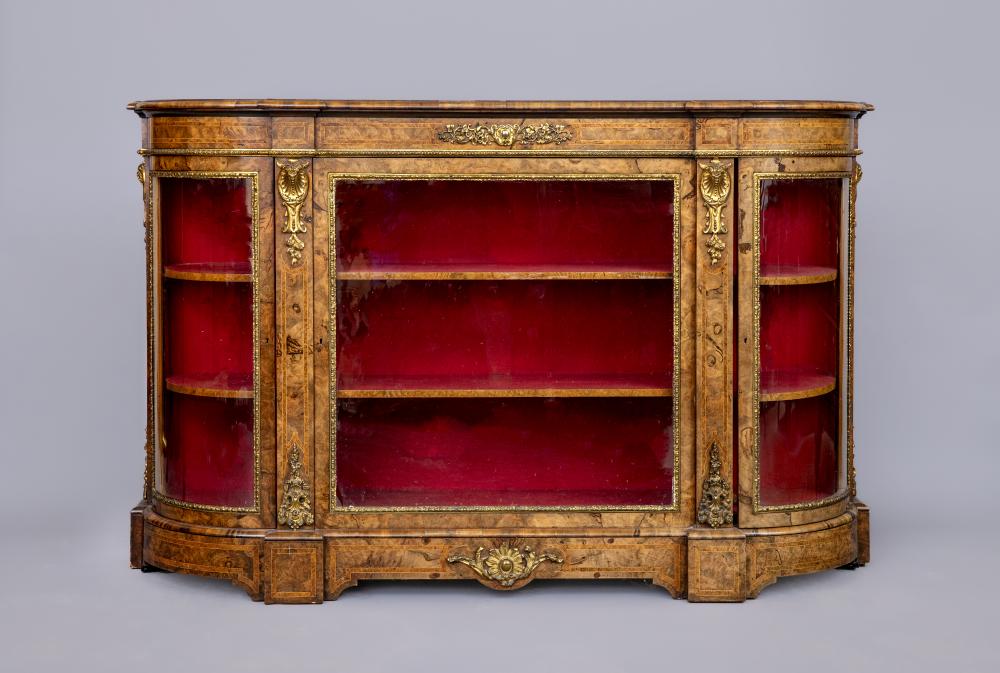 A VICTORIAN BURR WALNUT CREDENZA of breakfront D form with amboyna banding and gilt metal mounts Image