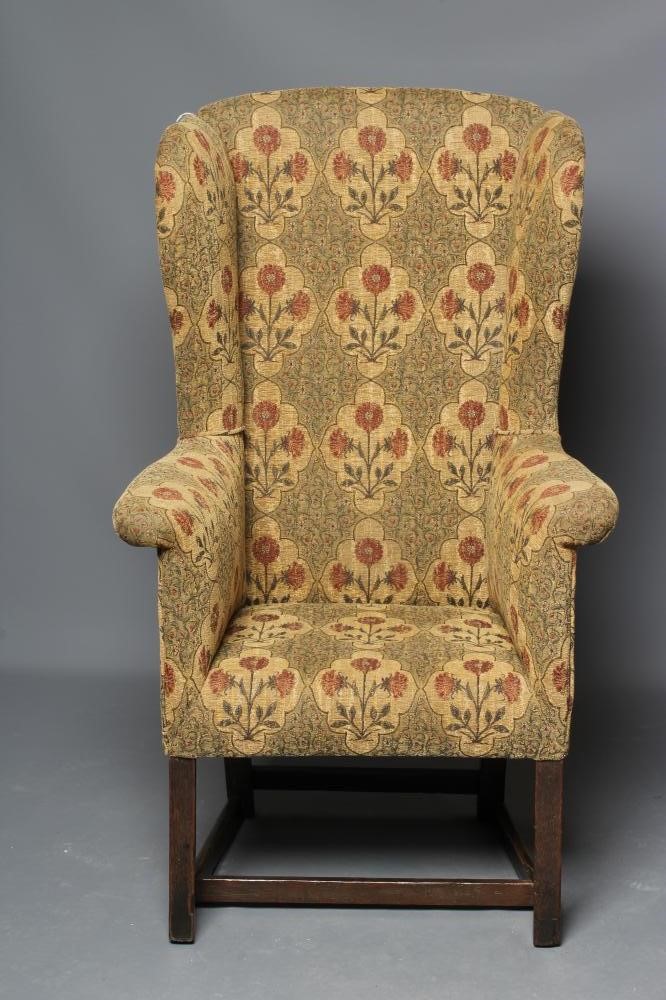 A GEORGIAN OAK FRAMED WING ARMCHAIR Image