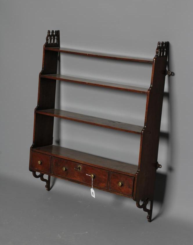 A GEORGIAN MAHOGANY GRADUATED WALL SHELF Image
