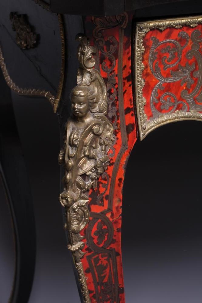 A NAPOLEON III RED BOULLE AND EBONISED BONHEUR DU JOUR Image