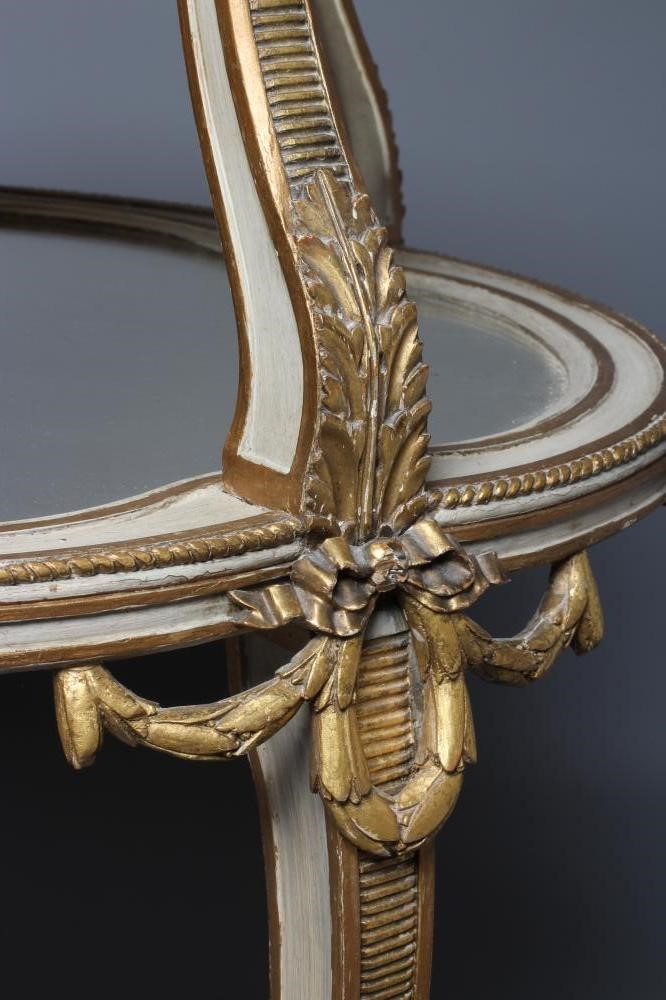 A FRENCH PAINTED AND PARCEL GILT ETAGERE Image