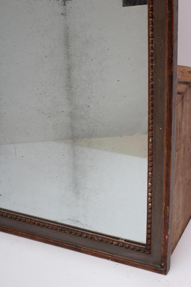 A FRENCH PAINTED AND PARCEL GILT PIER GLASS Image