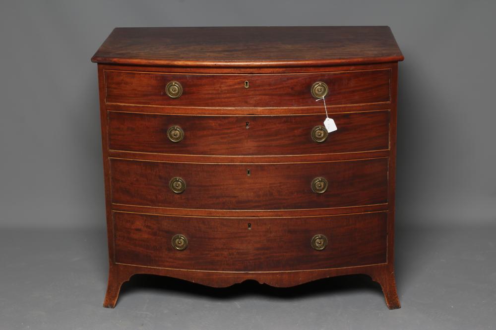 A GEORGIAN MAHOGANY BOWED CHEST, late 18th century, the moulded edged top over two short and three Image