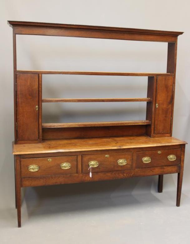 A GEORGIAN OAK AND ELM DRESSER Image