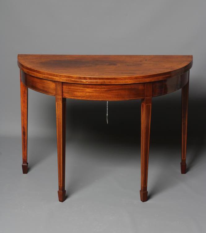A GEORGIAN MAHOGANY FOLDING TEA TABLE Image