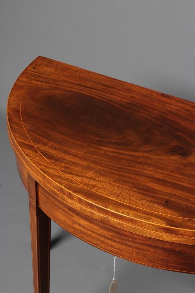 A GEORGIAN MAHOGANY FOLDING TEA TABLE Image