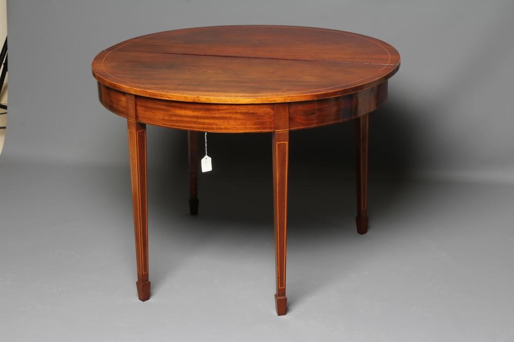 A GEORGIAN MAHOGANY FOLDING TEA TABLE Image