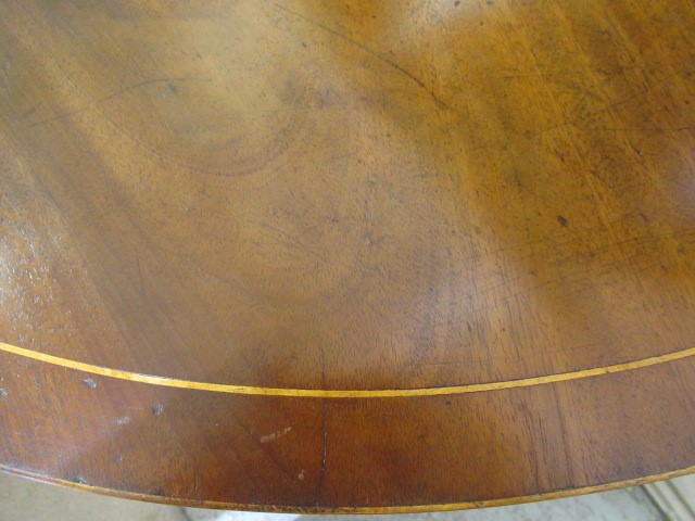 A GEORGIAN MAHOGANY FOLDING TEA TABLE Image