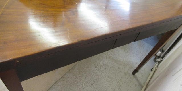 A GEORGIAN MAHOGANY FOLDING TEA TABLE Image