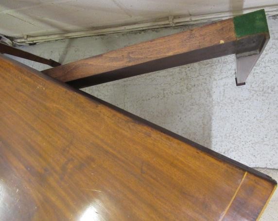 A GEORGIAN MAHOGANY FOLDING TEA TABLE Image