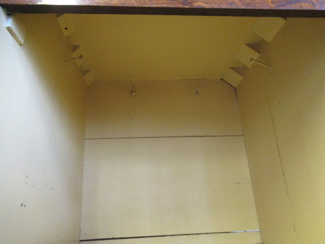 A LARGE GEORGIAN OAK AND MAHOGANY BANDED HOUSEKEEPERS CUPBOARD Image