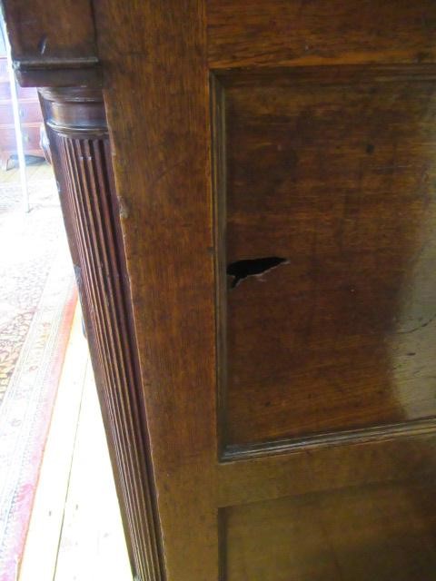 A LARGE GEORGIAN OAK AND MAHOGANY BANDED HOUSEKEEPERS CUPBOARD Image