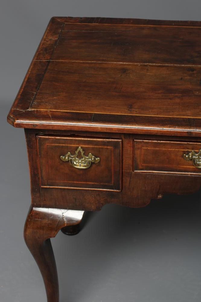 A GEORGIAN WALNUT LOWBOY Image