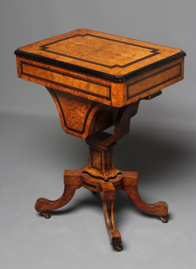 A VICTORIAN BURR WALNUT WORK TABLE of canted oblong form with ebonised banding and stringing Image