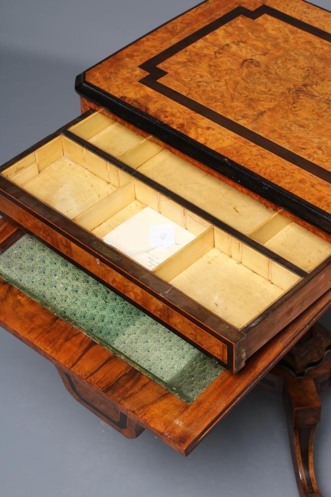 A VICTORIAN BURR WALNUT WORK TABLE of canted oblong form with ebonised banding and stringing Image
