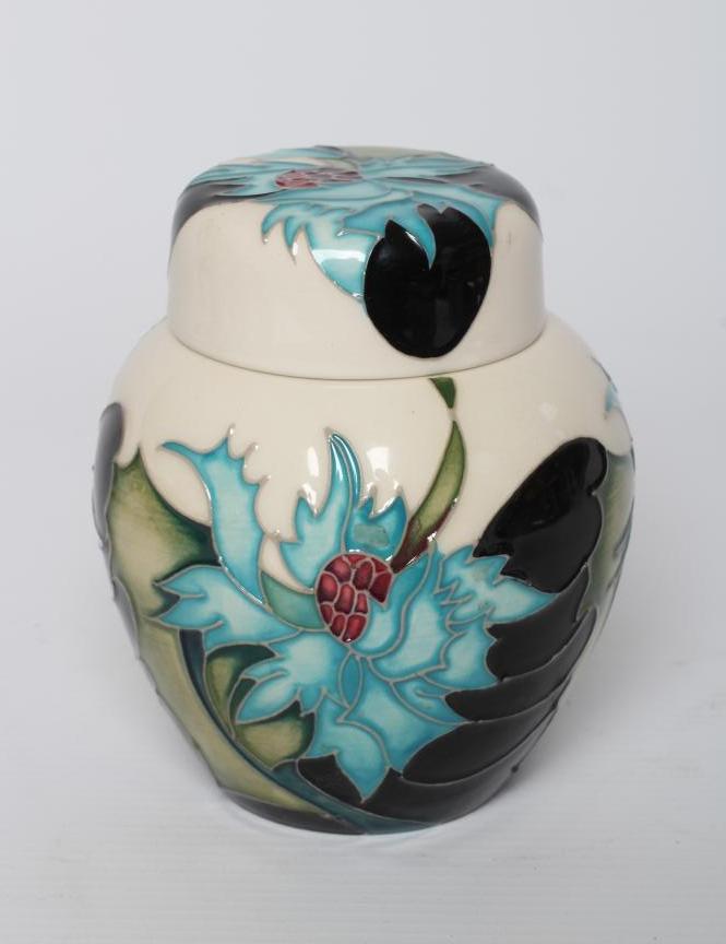 A MOORCROFT POTTERY SEA HOLLY PATTERN JAR AND COVER, 2014, designed by Emma Bossons, impressed Image
