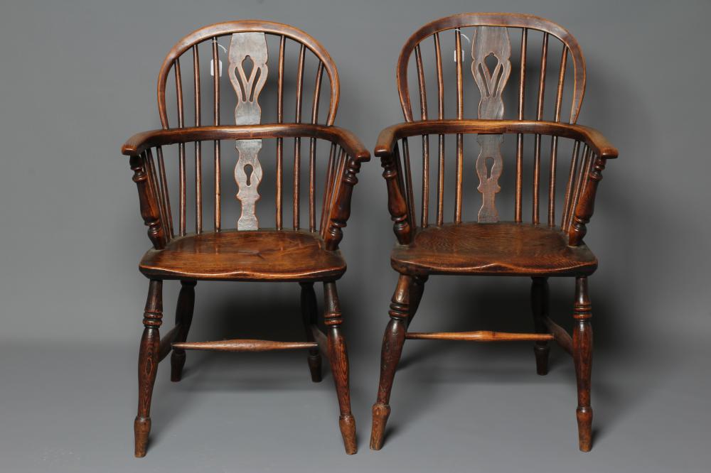 A MATCHED PAIR OF ASH AND ELM WINDSOR ARMCHAIRS Image