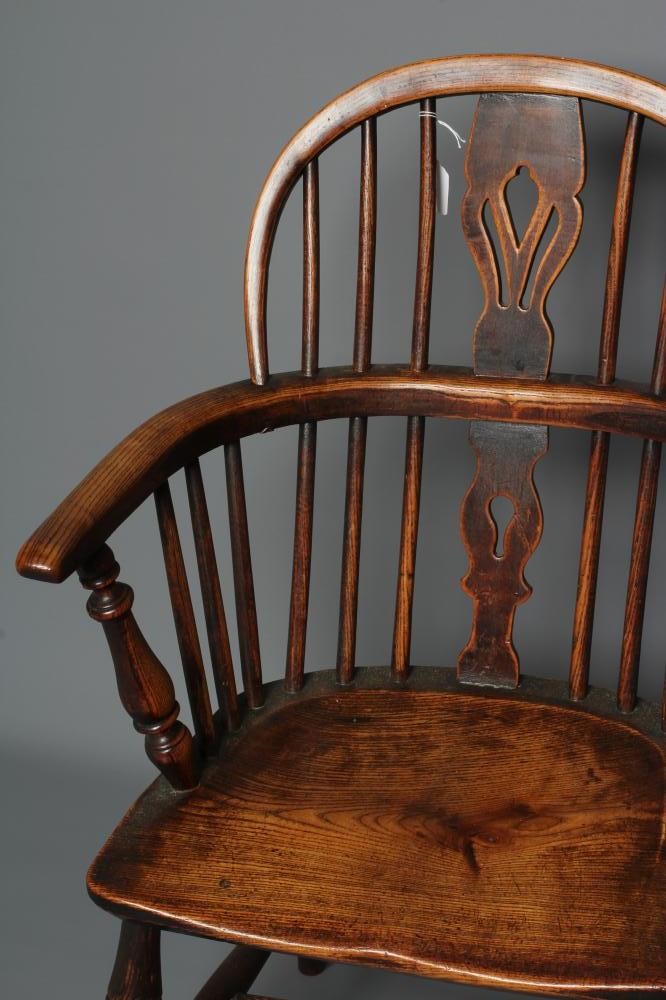 A MATCHED PAIR OF ASH AND ELM WINDSOR ARMCHAIRS Image