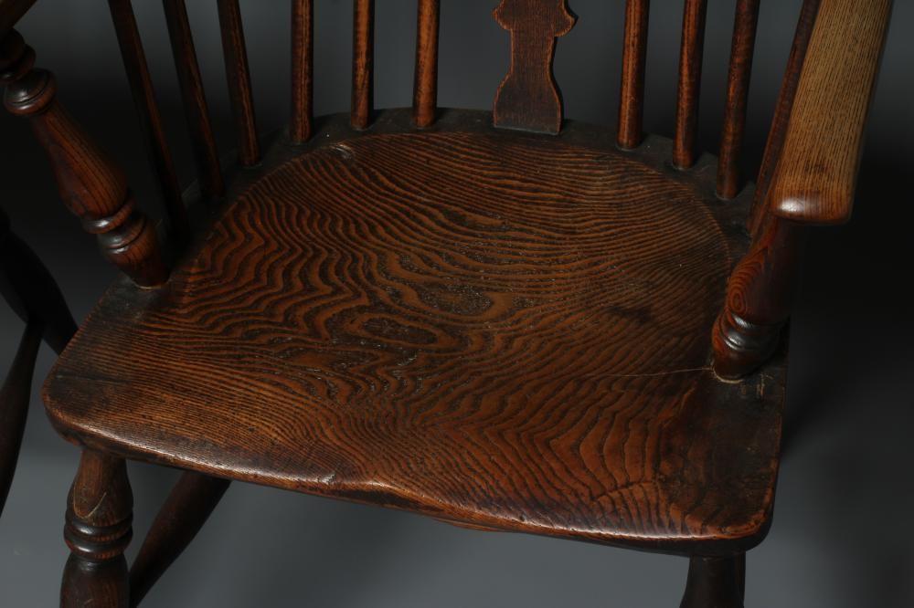 A MATCHED PAIR OF ASH AND ELM WINDSOR ARMCHAIRS Image