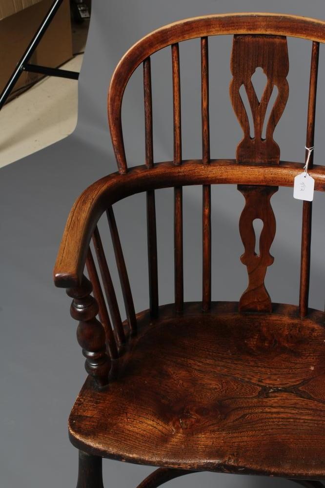 AN ASH AND ELM WINDSOR ARMCHAIR Image