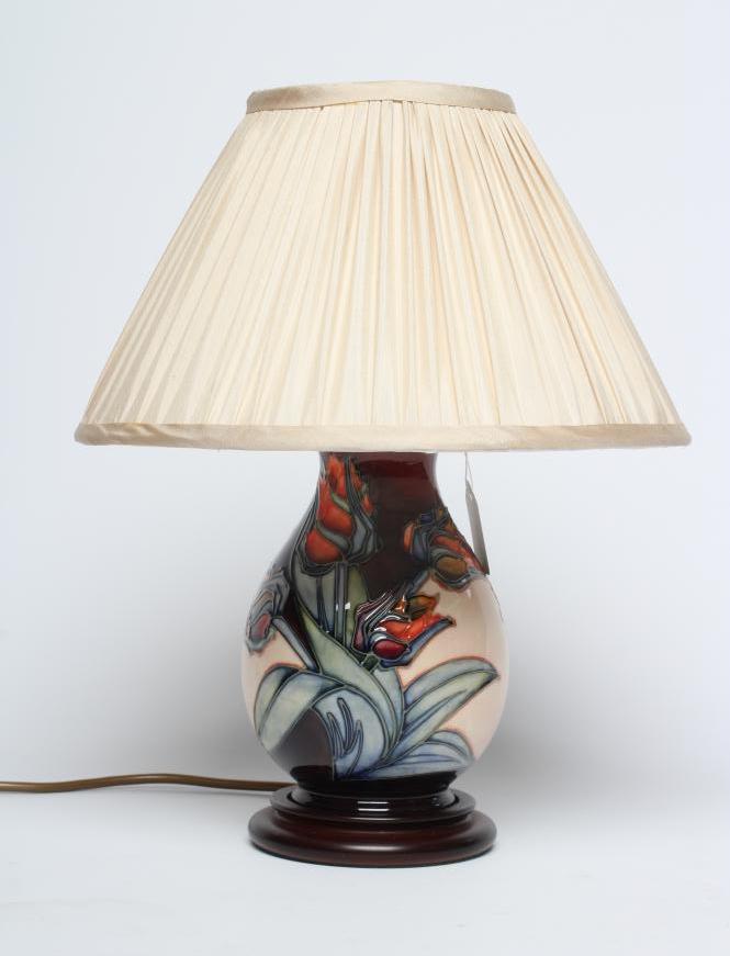 A MOORCROFT POTTERY RED TULIP PATTERN ELECTRIC TABLE LAMP BASE, modern, of ovoid form designed by Image