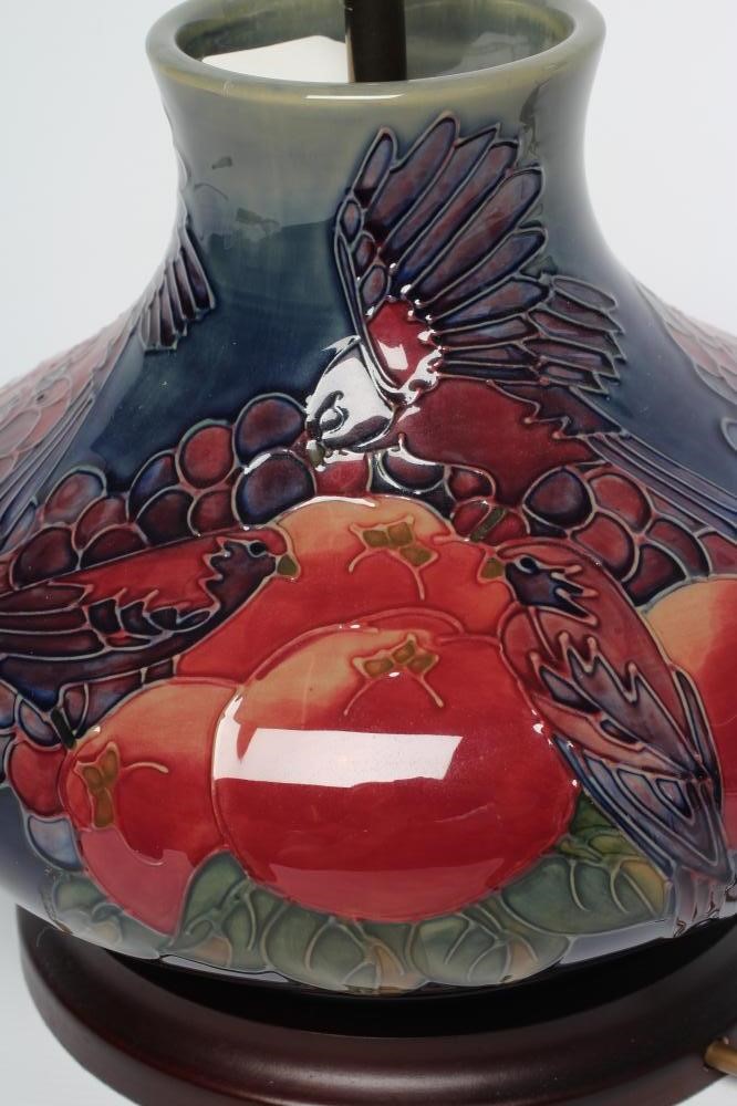 A MOORCROFT POTTERY FINCHES PATTERN ELECTRIC TABLE LAMP BASE, modern, of squat globular form Image