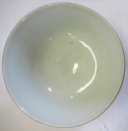 A CHINESE PORCELAIN SMALL BOWL, the iron red exterior reverse decorated with bamboo, six character Image