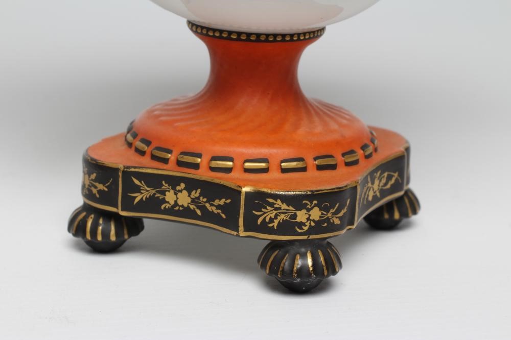 A PAIR OF FRENCH WHITE OPAQUE GLASS EMPIRE STYLE URNS Image